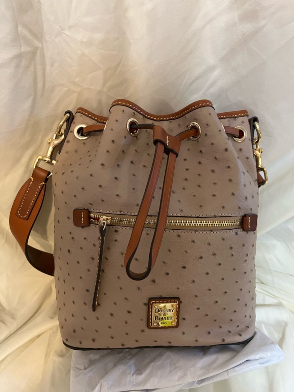 Dooney & Bourke Taupe Ostrich-Embossed Bucket Bag with Tan Trim